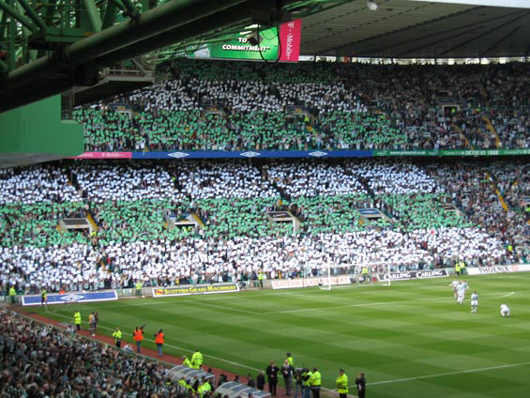 Celtic-Fans beim Spiel gegen Aberdeen.<br />Bild: www.bfc75kleinostheim.de“><figcaption>Celtic-Fans beim Spiel gegen Aberdeen.<br />Bild: www.bfc75kleinostheim.de</figcaption></figure>
            </div>

                    </article>

                <section class=