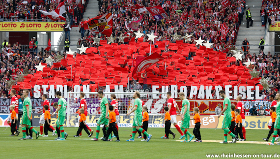 Choreografie von Mainzer Fans für den Namen Stadion am Europakeisel<br />    <button type=