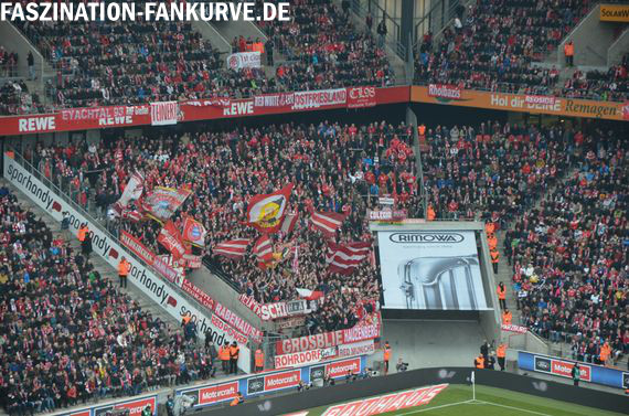 Die Gästeblock der Bundesliga machen die Bayern Fans locker voll, manchmal würden die Bestellungen reichen, das ganze Stadion zu füllen<br />Bild: Faszination Fankurve”><figcaption>Die Gästeblock der Bundesliga machen die Bayern Fans locker voll, manchmal würden die Bestellungen reichen, das ganze Stadion zu füllen<br />Bild: Faszination Fankurve</figcaption></figure>                </div>
                
                <!-- 5) Stellungnahme: rote Überschrift (wie alte Site), Fließtext nur im Kasten #F4F4F4 -->
                
                <!-- 6) Werbung 2 -->
                <div class=