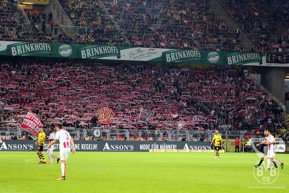 Die Fans des 1. FC Köln beim Auswärtsspiel in Dortmund.<br />Bild: BVB-Fanabteilung.de”><figcaption>Die Fans des 1. FC Köln beim Auswärtsspiel in Dortmund.<br />Bild: BVB-Fanabteilung.de</figcaption></figure>
                </div>
                
                <!-- YouTube (Meta-Feld) -->
                
            </div>
        </article>

                <script>
        (function() {
            var root = document.querySelector('.ff-single-news-gallery');
            if (!root) return;
            var slides = root.querySelectorAll('.ff-single-news-gallery-slide');
            var dots = root.querySelectorAll('.ff-single-news-gallery-dot');
            var prev = root.querySelector('.ff-single-news-gallery-prev');
            var next = root.querySelector('.ff-single-news-gallery-next');
            var n = slides.length;
            if (n < 2) return;
            var i = 0;
            function closeAllImgInfo() {
                root.querySelectorAll('.ff-fv-img-info-host.is-info-open').forEach(function(host) {
                    host.classList.remove('is-info-open');
                    var b = host.querySelector('.ff-fv-img-info-btn');
                    var p = host.querySelector('.ff-fv-img-info-panel');
                    if (b) b.setAttribute('aria-expanded', 'false');
                    if (p) p.setAttribute('aria-hidden', 'true');
                });
            }
            function show(idx) {
                closeAllImgInfo();
                i = ((idx % n) + n) % n;
                for (var s = 0; s < n; s++) {
                    if (s === i) slides[s].removeAttribute('hidden'); else slides[s].setAttribute('hidden', '');
                }
                for (var s = 0; s < dots.length; s++) {
                    dots[s].classList.toggle('is-active', s === i);
                    dots[s].setAttribute('aria-selected', s === i ? 'true' : 'false');
                }
            }
            if (prev) prev.addEventListener('click', function() { show(i - 1); });
            if (next) next.addEventListener('click', function() { show(i + 1); });
            for (var d = 0; d < dots.length; d++) {
                (function(di) { dots[di].addEventListener('click', function() { show(di); }); })(d);
            }
        })();
        </script>
        
        <!-- Kommentare -->
                <section class=
