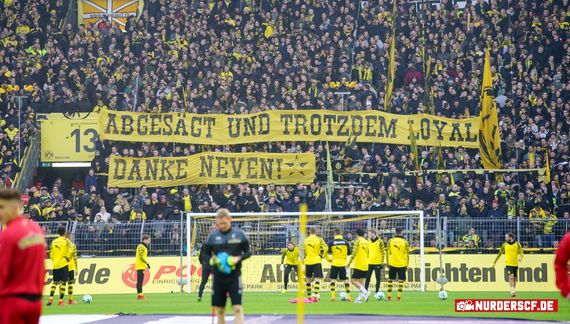 Spruchband der Desperados Dortmund.<br />Bild: nur-der-scf.de”><figcaption>Spruchband der Desperados Dortmund.<br />Bild: nur-der-scf.de</figcaption></figure>
<figure><img decoding=