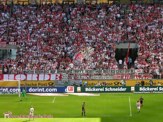 Spruchband der Definitionsmacht Colonia.<br />Bild: RoteBoecke.de”><figcaption>Spruchband der Definitionsmacht Colonia.<br />Bild: RoteBoecke.de</figcaption></figure>
<figure><img decoding=