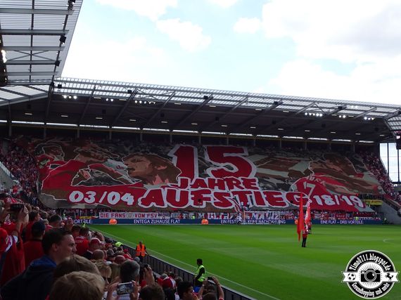 Die Choreografie der Mainz 05-Fans.<br />Bild: timo0711.blogspot.de”><figcaption>Die Choreografie der Mainz 05-Fans.<br />Bild: timo0711.blogspot.de</figcaption></figure>
<figure><img decoding=
