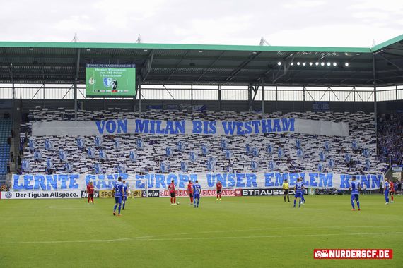 Die Choreografie im Block U.<br />Bild: nur-der-scf.de”><figcaption>Die Choreografie im Block U.<br />Bild: nur-der-scf.de</figcaption></figure>
<figure><img decoding=