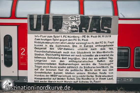 Die Aktion der Ultras Nürnberg.<br />Bild: Faszination-Nordkurve.de”><figcaption>Die Aktion der Ultras Nürnberg.<br />Bild: Faszination-Nordkurve.de</figcaption></figure>
<figure><img decoding=