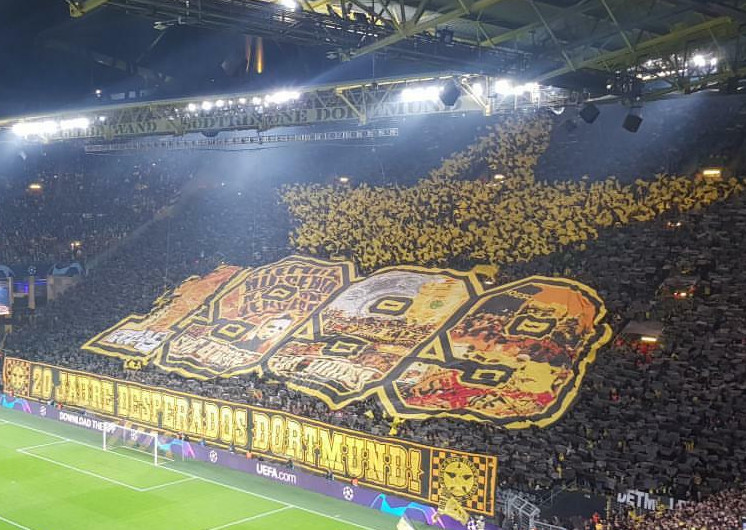 Die Choreografie zu 20 Jahren Desperados Dortmund.<br />Bild: schindler_82″><figcaption>Die Choreografie zu 20 Jahren Desperados Dortmund.<br />Bild: schindler_82</figcaption></figure>
                </div>
                
                <!-- YouTube (Meta-Feld) -->
                
            </div>
        </article>

                <script>
        (function() {
            var root = document.querySelector('.ff-single-news-gallery');
            if (!root) return;
            var slides = root.querySelectorAll('.ff-single-news-gallery-slide');
            var dots = root.querySelectorAll('.ff-single-news-gallery-dot');
            var prev = root.querySelector('.ff-single-news-gallery-prev');
            var next = root.querySelector('.ff-single-news-gallery-next');
            var n = slides.length;
            if (n < 2) return;
            var i = 0;
            function closeAllImgInfo() {
                root.querySelectorAll('.ff-fv-img-info-host.is-info-open').forEach(function(host) {
                    host.classList.remove('is-info-open');
                    var b = host.querySelector('.ff-fv-img-info-btn');
                    var p = host.querySelector('.ff-fv-img-info-panel');
                    if (b) b.setAttribute('aria-expanded', 'false');
                    if (p) p.setAttribute('aria-hidden', 'true');
                });
            }
            function show(idx) {
                closeAllImgInfo();
                i = ((idx % n) + n) % n;
                for (var s = 0; s < n; s++) {
                    if (s === i) slides[s].removeAttribute('hidden'); else slides[s].setAttribute('hidden', '');
                }
                for (var s = 0; s < dots.length; s++) {
                    dots[s].classList.toggle('is-active', s === i);
                    dots[s].setAttribute('aria-selected', s === i ? 'true' : 'false');
                }
            }
            if (prev) prev.addEventListener('click', function() { show(i - 1); });
            if (next) next.addEventListener('click', function() { show(i + 1); });
            for (var d = 0; d < dots.length; d++) {
                (function(di) { dots[di].addEventListener('click', function() { show(di); }); })(d);
            }
        })();
        </script>
        
        <!-- Kommentare -->
                <section class=