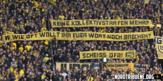 Die Ultras kritisieren aktuell vor allem, dass der DFB wieder auf Kollektivbestrafung setzt.<br />Bild: Nordtribuene.org”><figcaption>Die Ultras kritisieren aktuell vor allem, dass der DFB wieder auf Kollektivbestrafung setzt.<br />Bild: Nordtribuene.org</figcaption></figure>
<figure><img decoding=